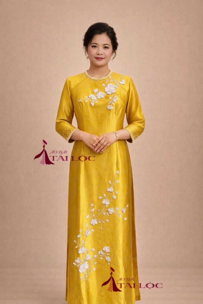 Áo dài bà sui vàng đồng lụa Ruby-V376